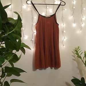 Gently used burnt orange pleated top